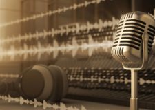 A silver microphone on a desk