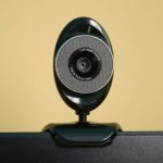 An oval shaped black web camera