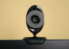 An oval shaped black web camera